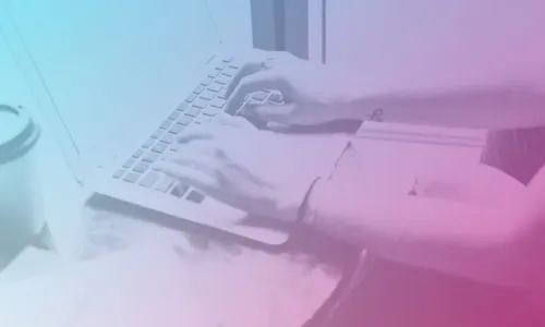 Person typing on a laptop